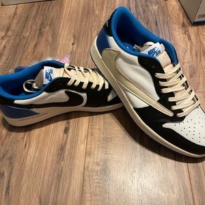 These are size 12 of the Travis Scott Jordan 1 lows. Never worn.